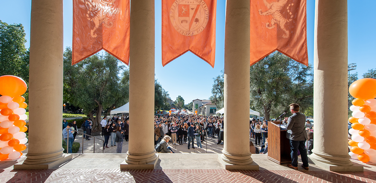 An Occidental staff member gives the welcome at an event for the Office of Admission