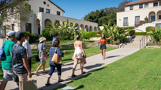 An Occidental student leads a group on a campus tour